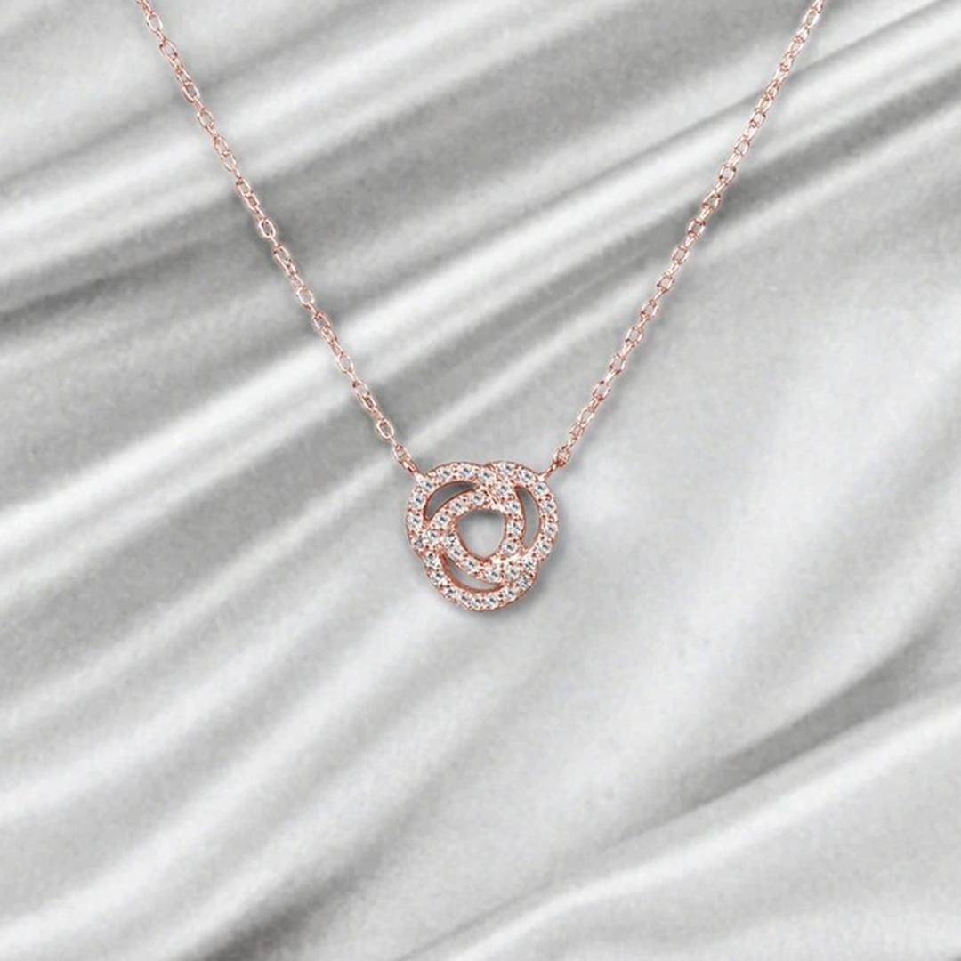 Modern 18k Gold Love Knot Diamond Pendant Necklace Infinity Knot Pendant Necklace For Sale