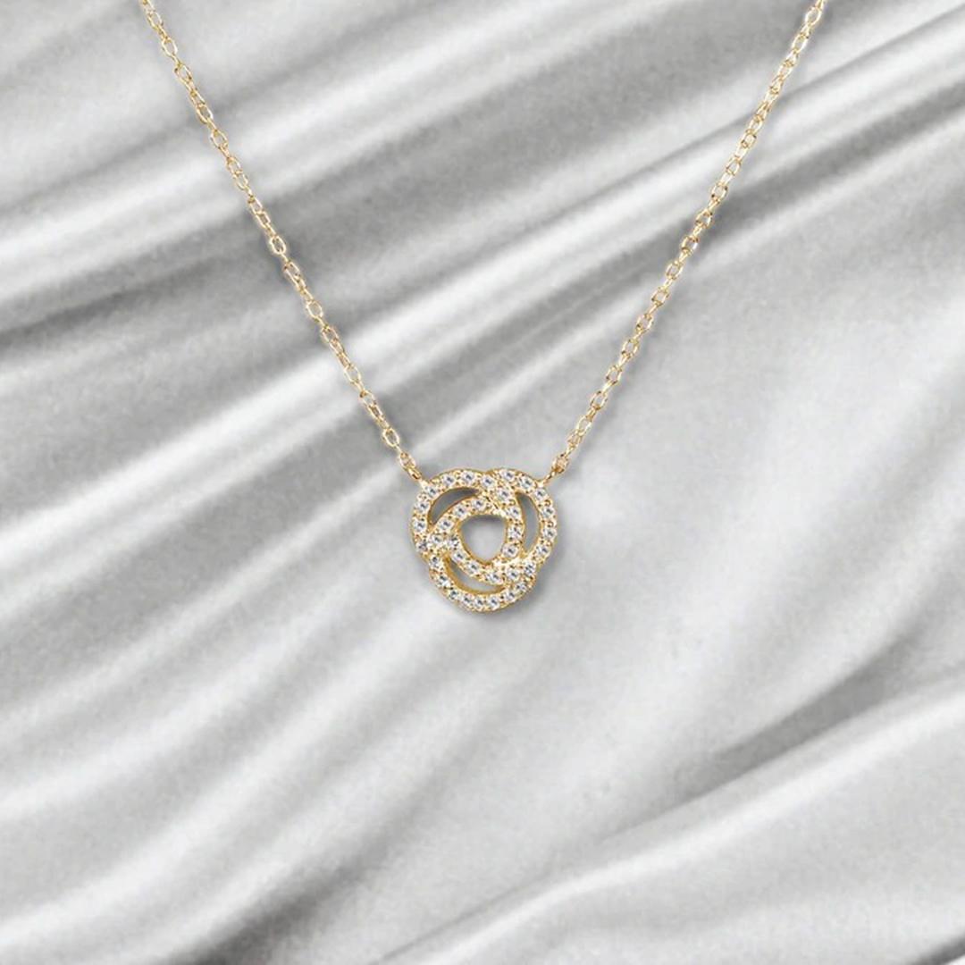 Round Cut 18k Gold Love Knot Diamond Pendant Necklace Infinity Knot Pendant Necklace For Sale