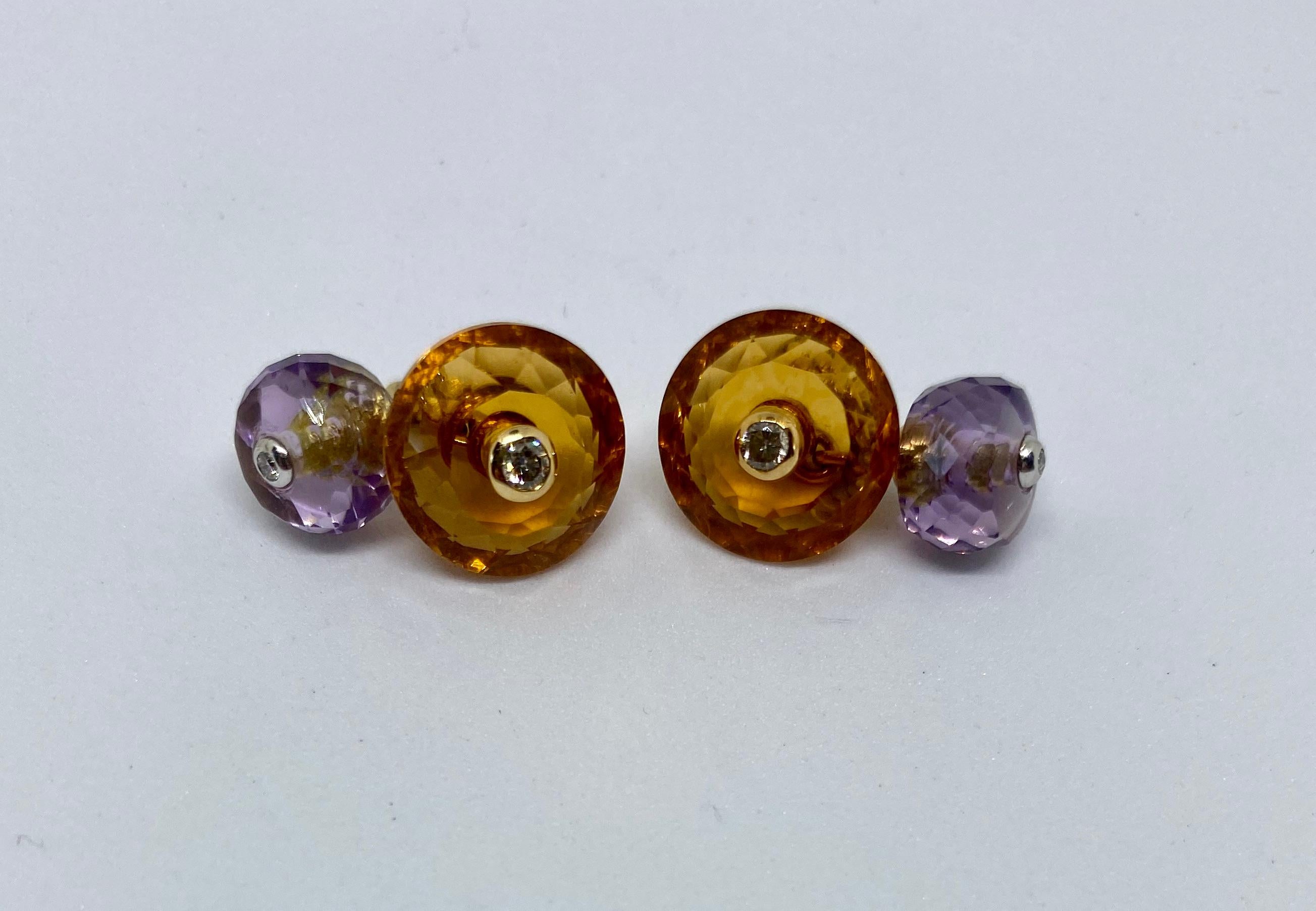 Beautiful and unusual cufflinks featuring two faceted Madera citrines and two amethysts, each set with a round, white diamond in 18K gold. As one, subtle example of the high quality design and workmanship, the diamonds are set in yellow gold against