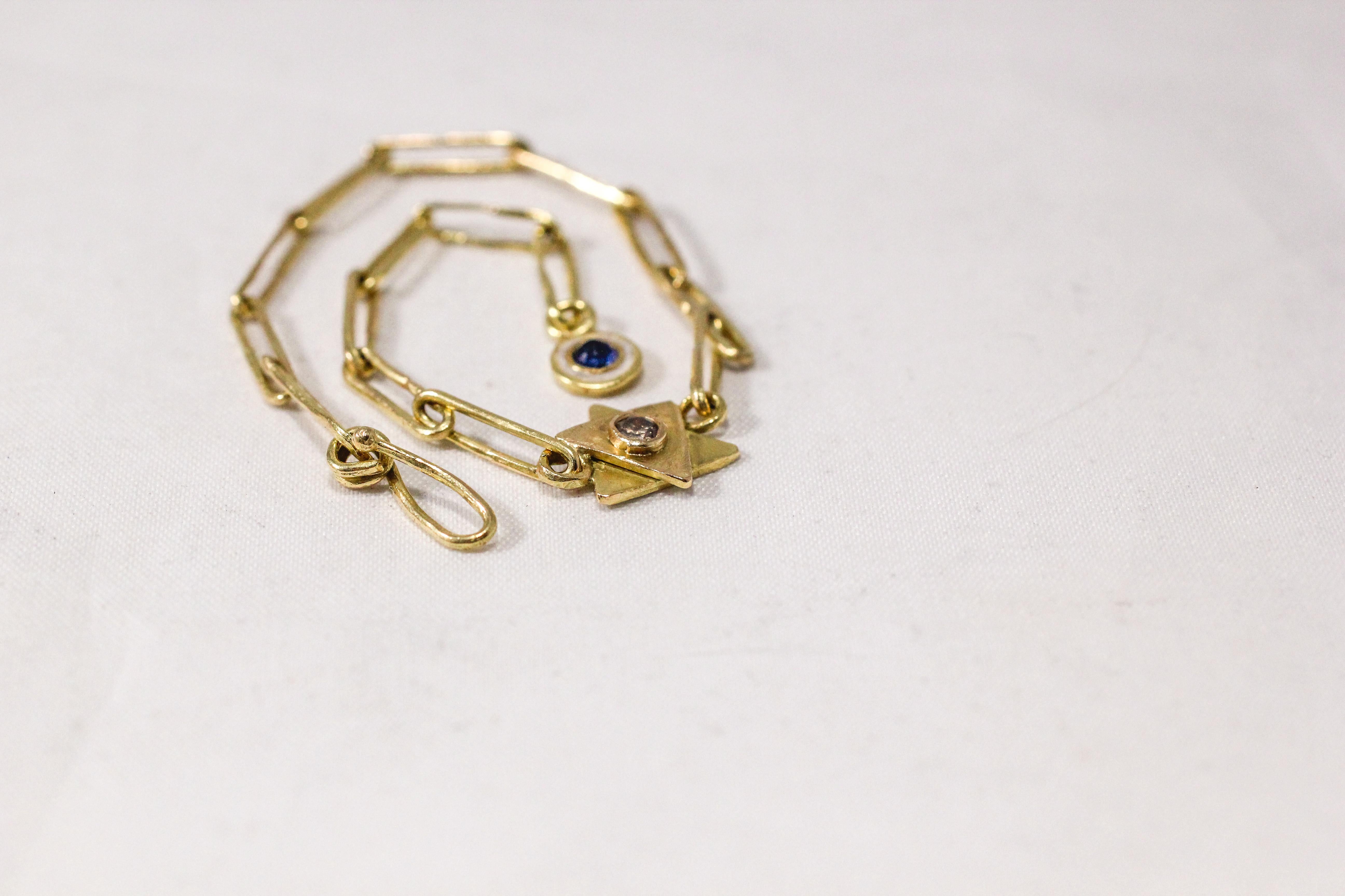Custom listing. This unique Magen David chain link charm bracelet is handcrafted in environmentally friendly recycled 18K gold. The bracelet is made up of Diamond inset Magen David, elongated oval shaped links, and is terminated with the enameled