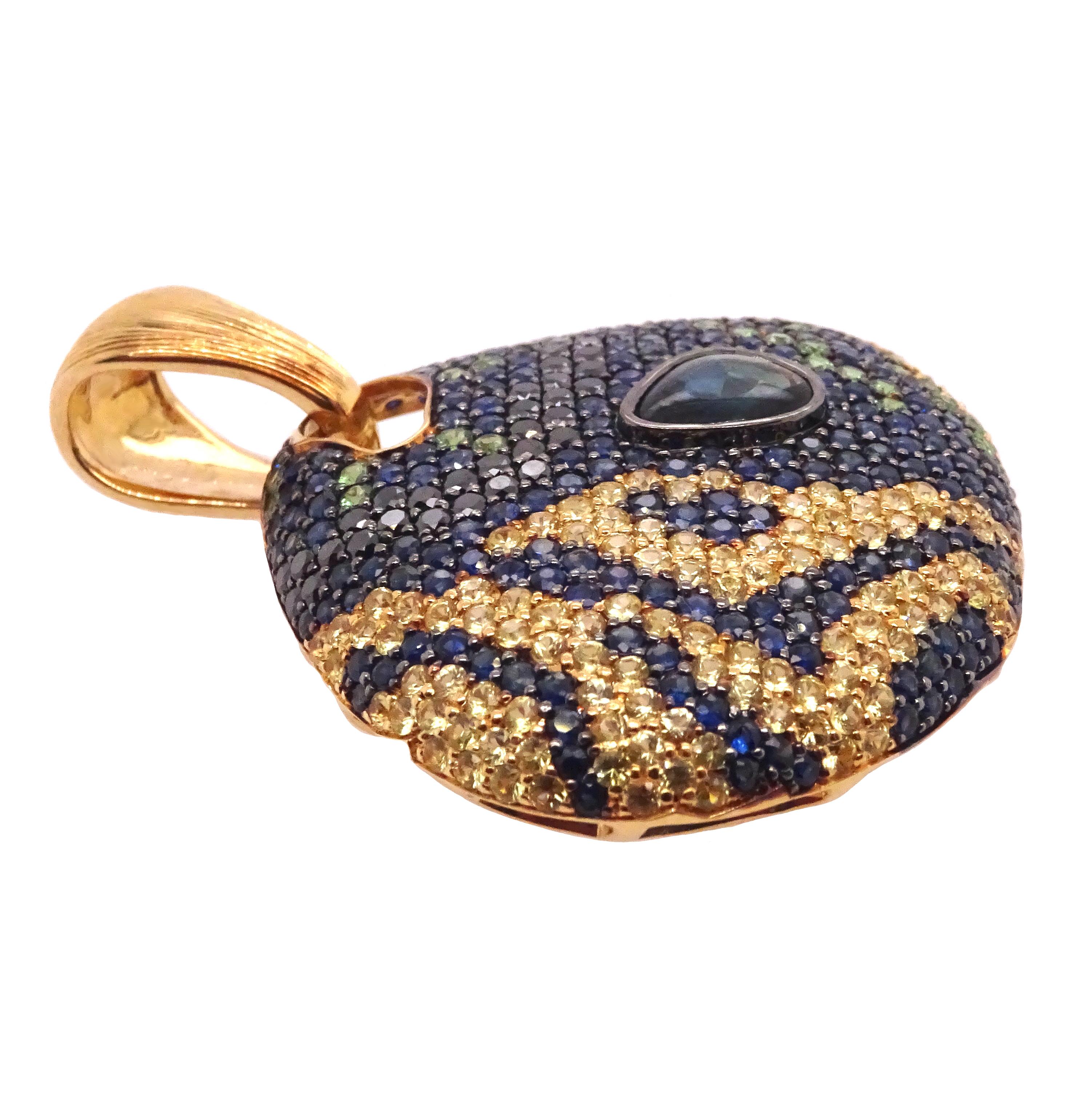 Ocean Dreams collection by VOTIVE.

Welcome to VOTIVE's Ocean Dreams collection, where the enchanting beauty of marine life comes to life in this exquisite 18K yellow gold pendant adorned with black diamonds, blue and yellow sapphires, and