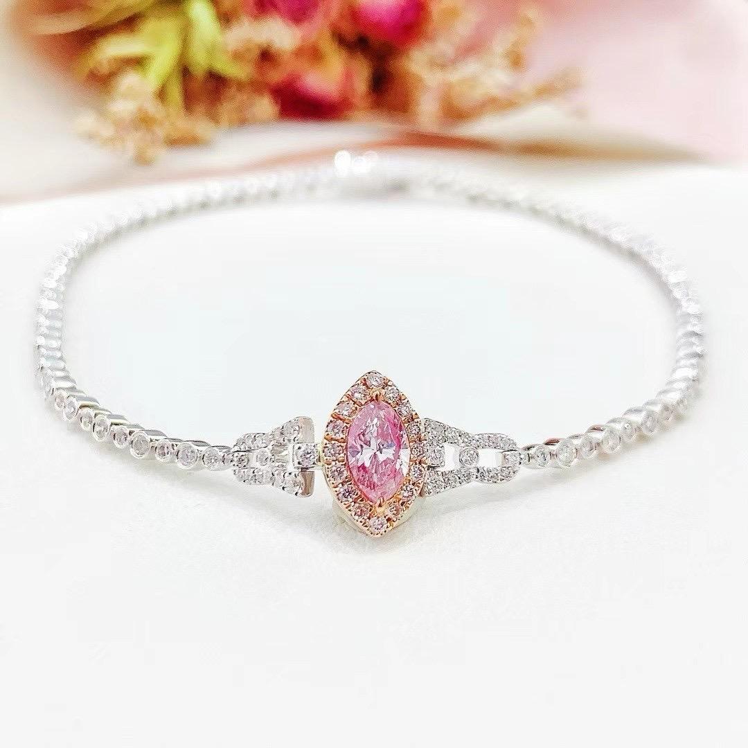 18K Gold Marquise-Cut Fancy Pink Diamond & Diamond Bracelet

1 Fancy Pink Diamond - 0.38 CT
Diamonds - 0.87 CT
Total Weight - 6.1 GM

