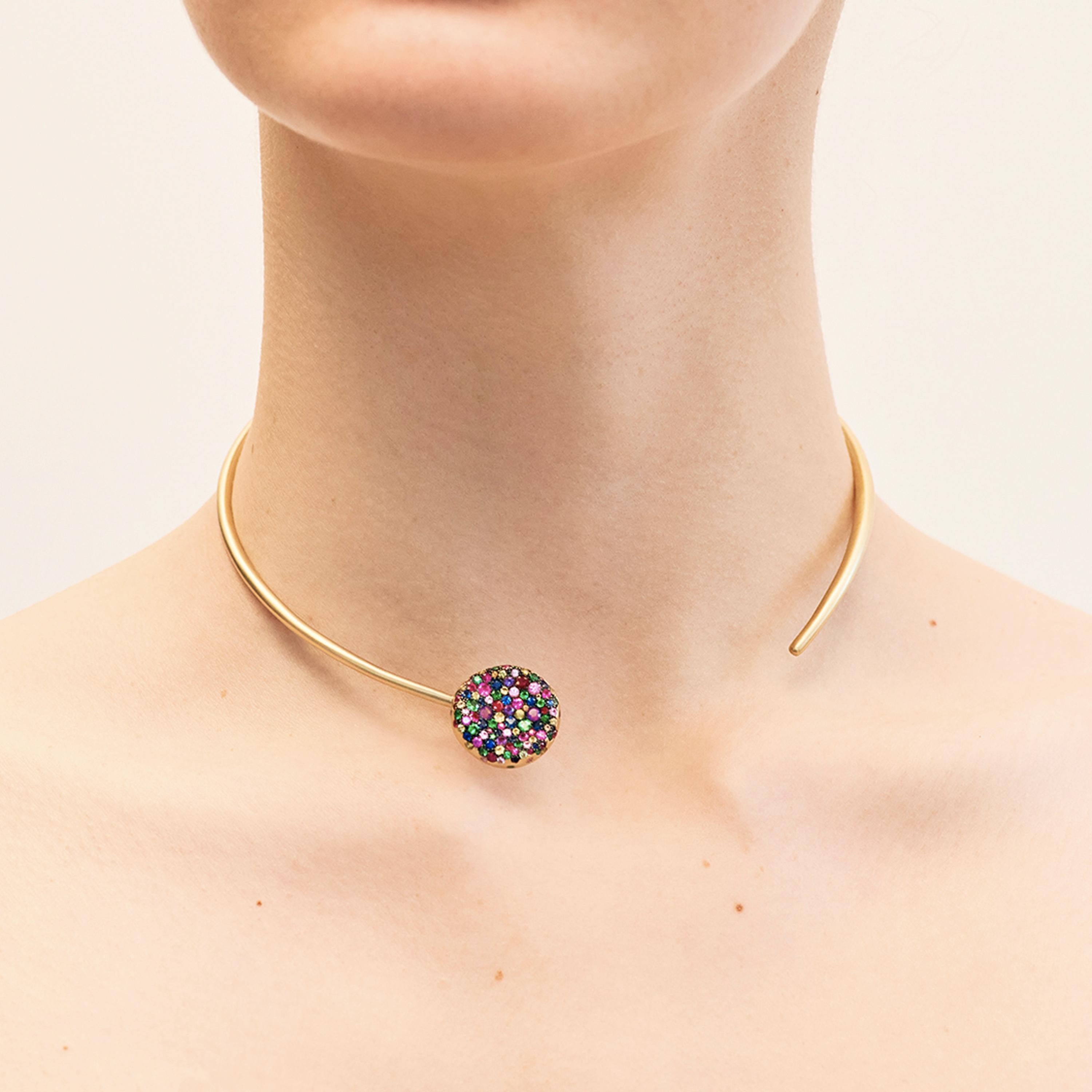 Nada Ghazal's beautiful chocker is crafted from 18 karat gold, and coloured with 2.90 carats of multi colored sapphires, amethysts and tsavorites (blue, pink, purple, orange, yellow, green).
 
While Nada Ghazal's pieces are in essence deeply