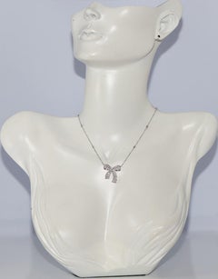 18k Gold Natural Brilliant Cut And Baguette Cut Diamond Bow Design Necklace