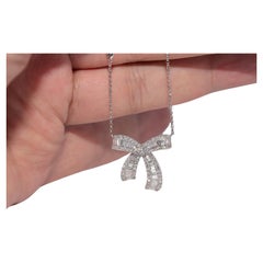 18k Gold Natural Brilliant Cut And Baguette Cut Diamond Bow Design Necklace