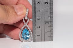 18k Gold Natural Diamond And Blue Topaz Decorated Drop Earring