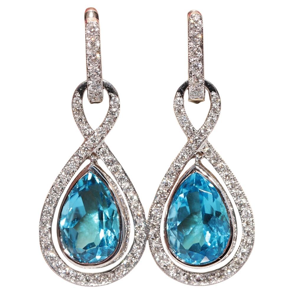 Orecchino a goccia decorato con diamanti naturali e topazio blu in oro 18 carati