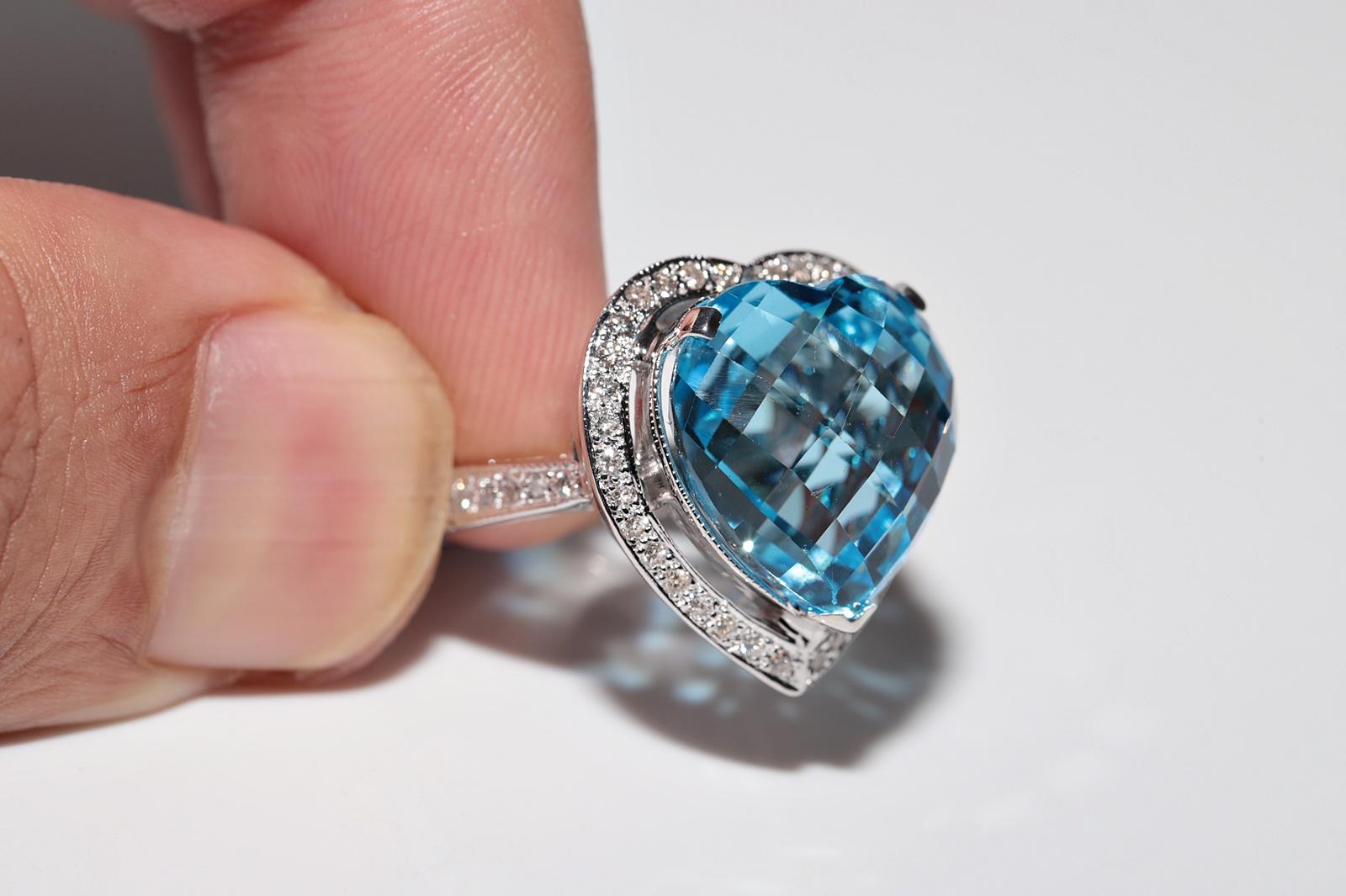 Bague en or 18 carats ornée d'un diamant naturel et d'une topaze bleue en forme de coeur fort en vente 5