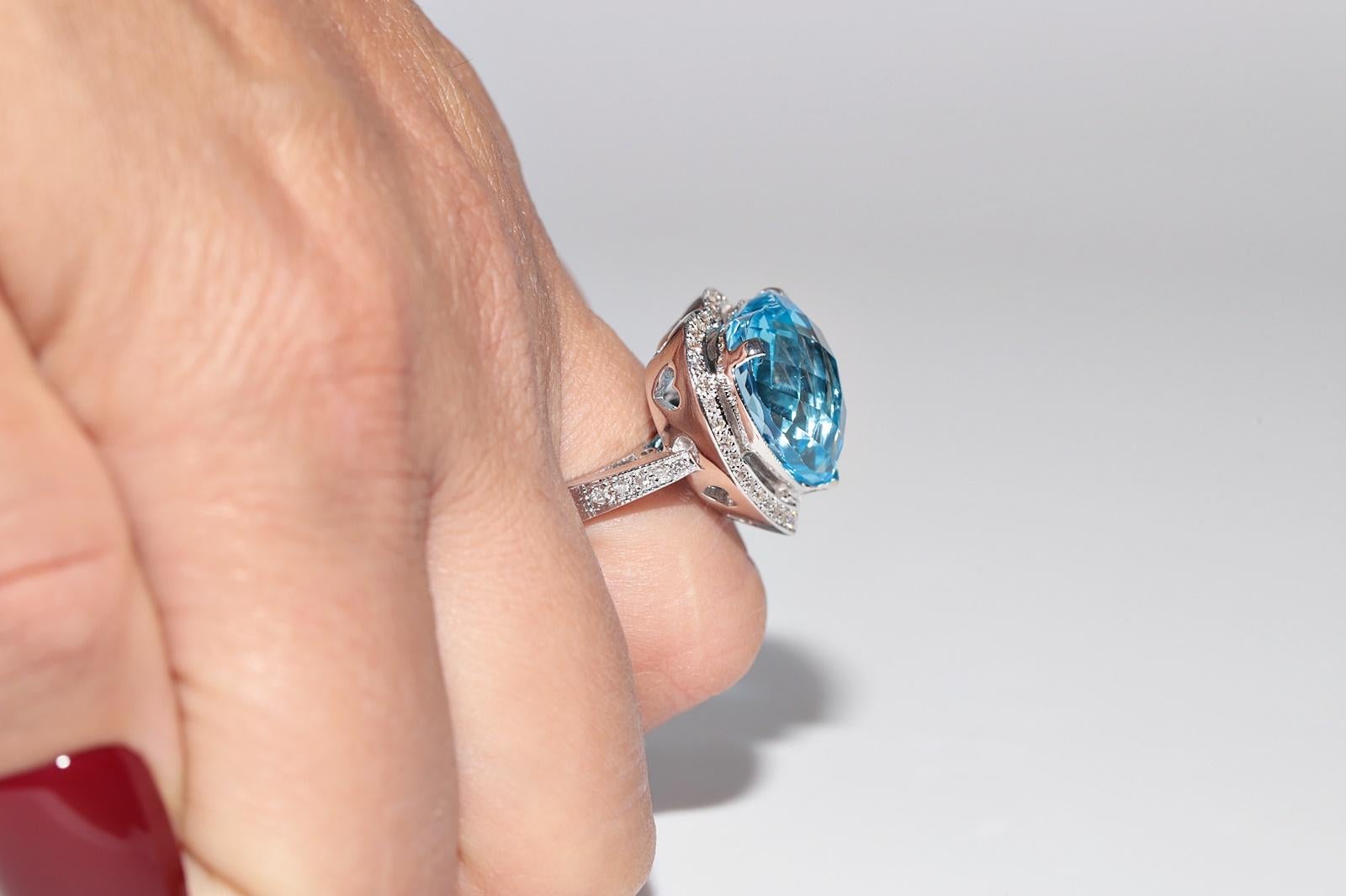 Bague en or 18 carats ornée d'un diamant naturel et d'une topaze bleue en forme de coeur fort en vente 9