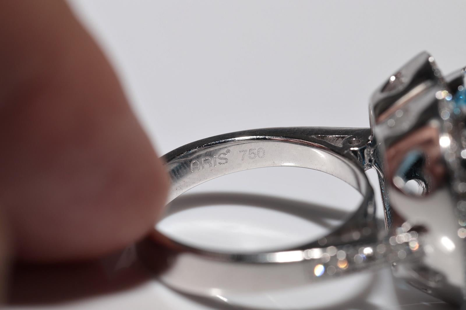 Bague en or 18 carats ornée d'un diamant naturel et d'une topaze bleue en forme de coeur fort en vente 1