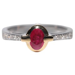Bague décorée en or 18 carats, diamant naturel et rubis taille cabochon