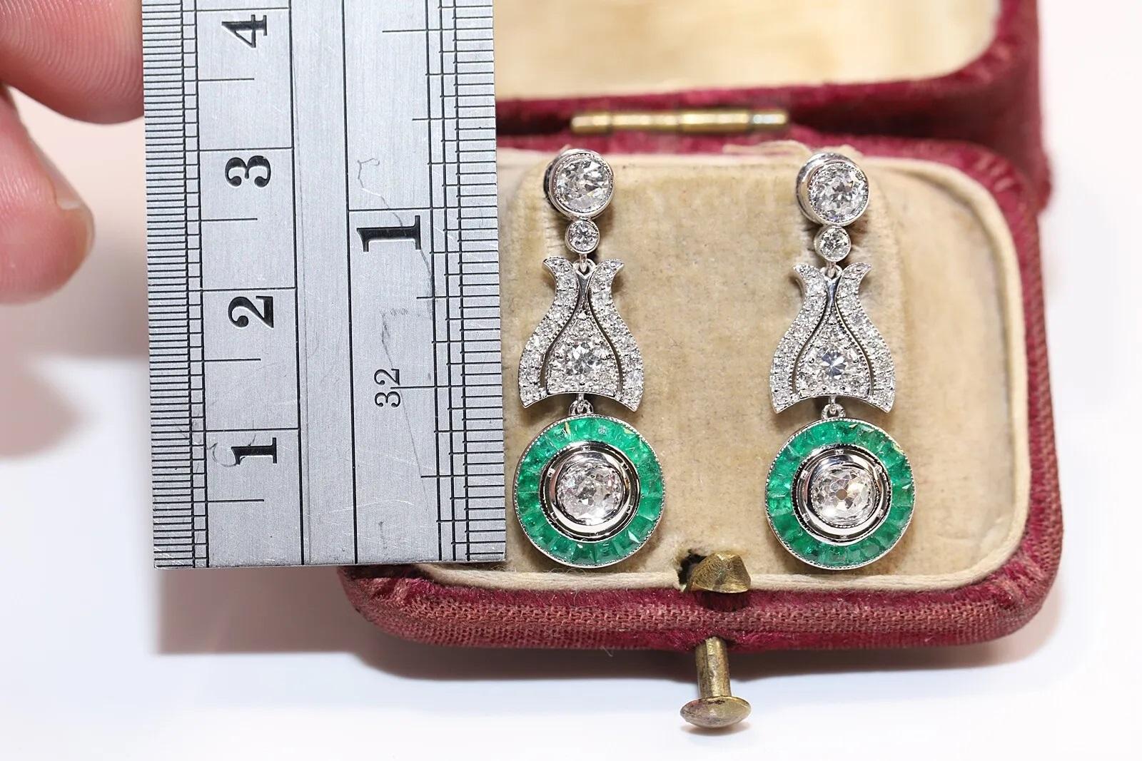 Modern 18K Gold Natural Diamond And Caliber Cut Emerald Decorated Drop Earring For Sale
