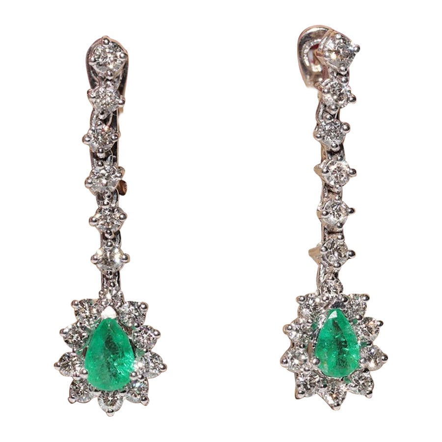 Orecchino con diamante naturale e smeraldo decorato in oro 18k