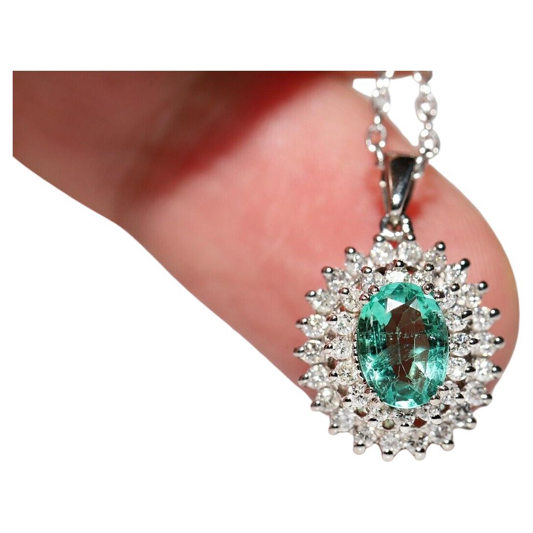 Collier pendentif en or 18k orné de diamants naturels et d'émeraudes
