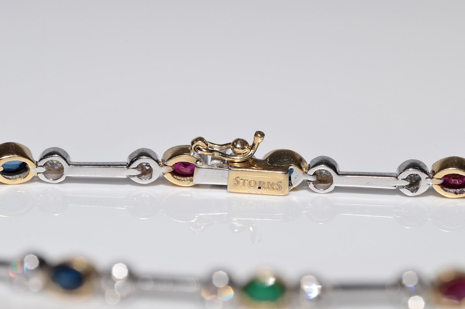 Tennisarmband aus 18 Karat Gold mit natürlichen Diamanten und Smaragden, Saphiren und Rubinen im Angebot 1