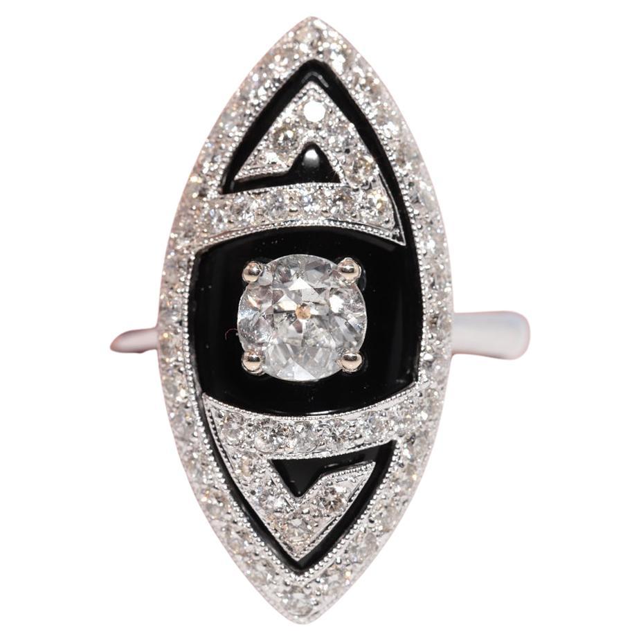 Bague navette décorée en or 18 carats, diamant naturel et onyx