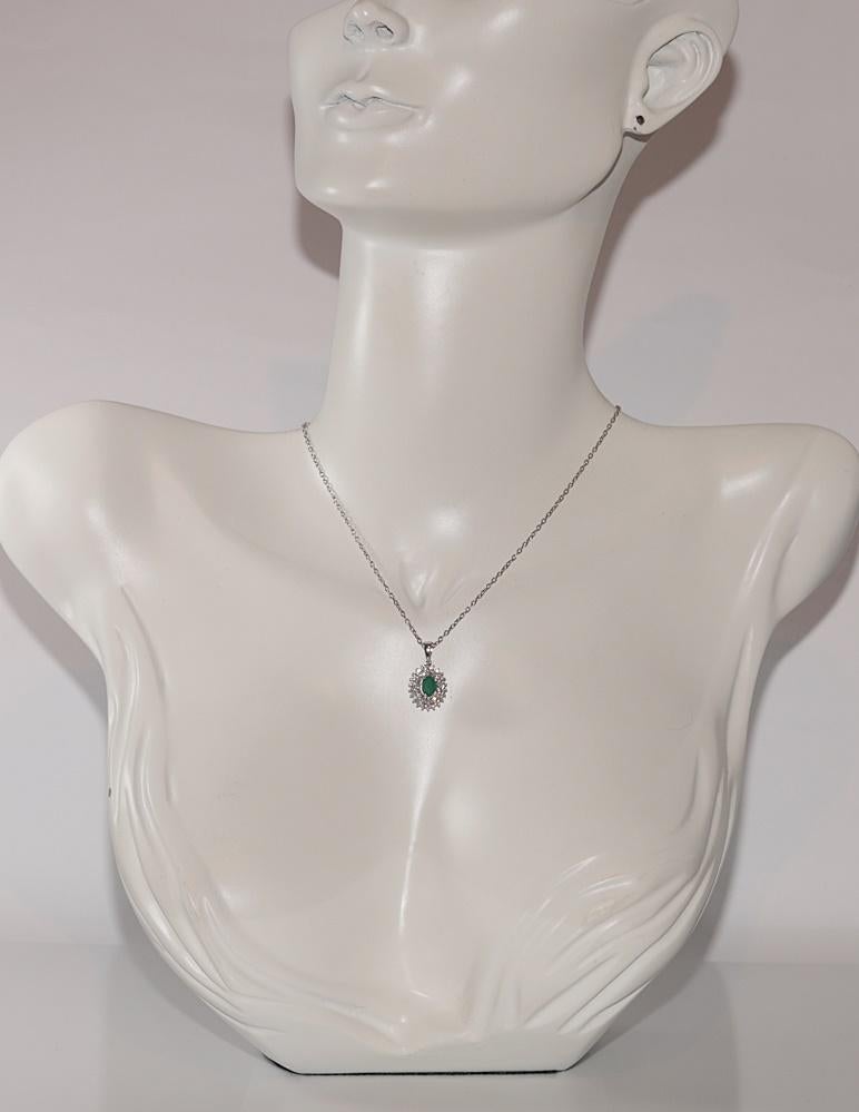 In very good condition.
Total weight is 4.6 grams.
Totally is diamond 0.32 ct.
The diamond is has G color and  vs-s1 clarity.
Totally is emerald 0.50 ct.
Total lenght is chain 45 cm.
Please contact for any questions.