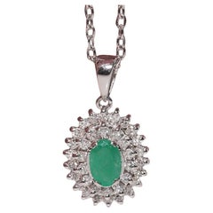Collier pendentif en or 18k orné de diamants naturels et d'émeraudes de taille ovale