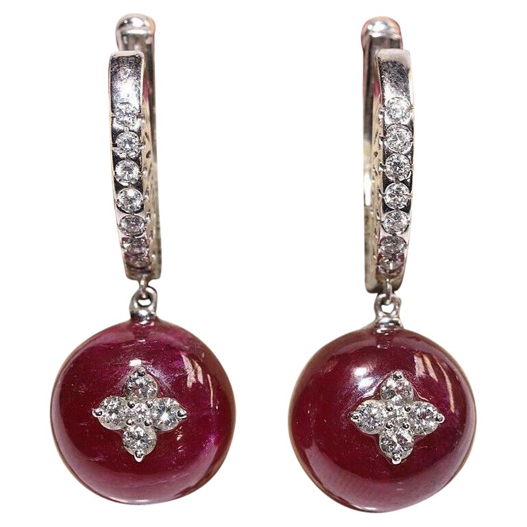 Boucle d
oreille pendante en or 18 carats avec diamant naturel et rubis, fabriquée en Italie par Ponte Vecchio en vente
