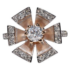 Jolie bague en or 18k ornée de diamants naturels