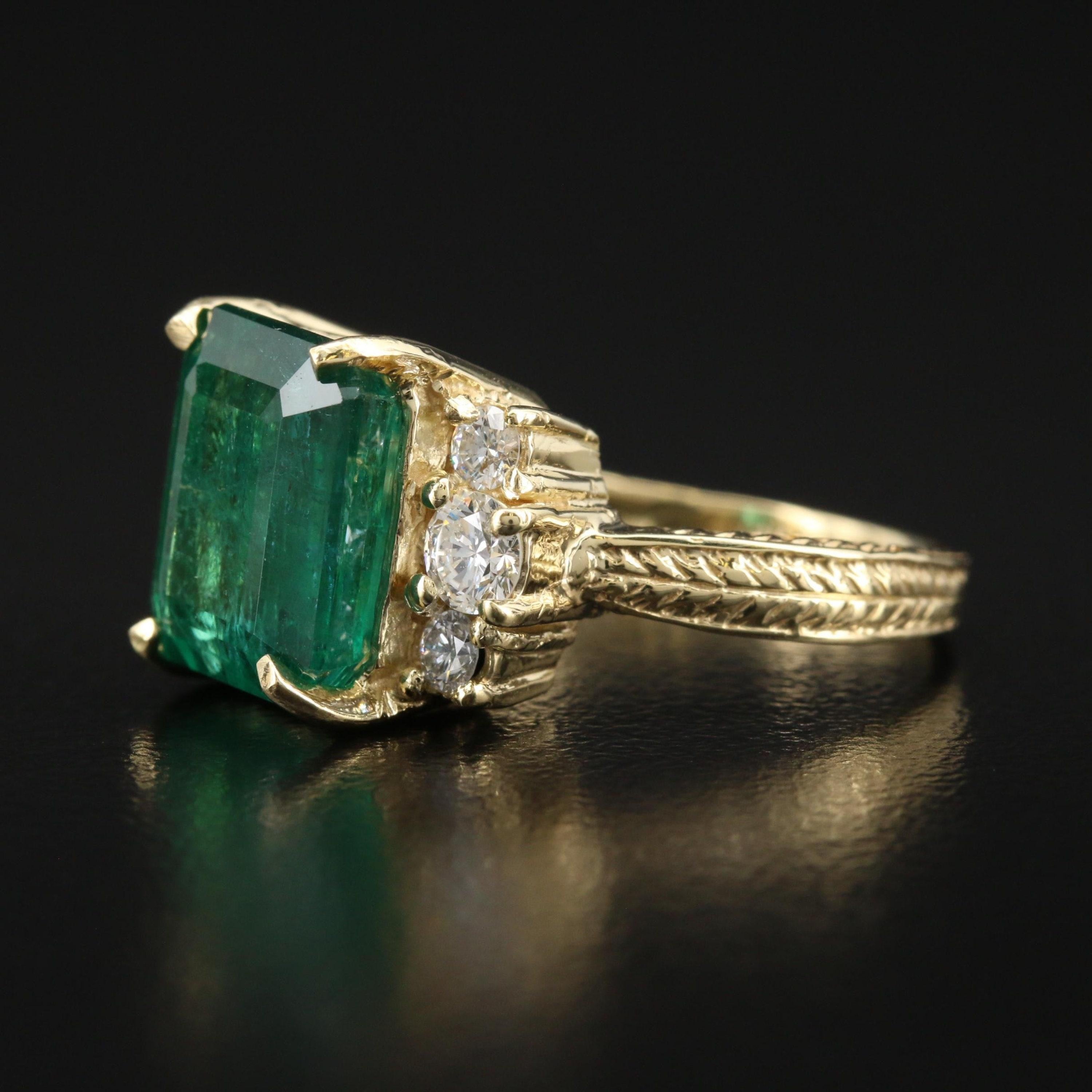 Art Deco 4 CT Certified Natural Emerald and Diamond Engagement Ring in 18K Gold

A stunning ring featuring IGI/GIA Certified 4.01 Carat Natural Emerald and 0.56 Carat of Diamond Accents set in 18K Solid Gold.

Emeralds are highly valued for their