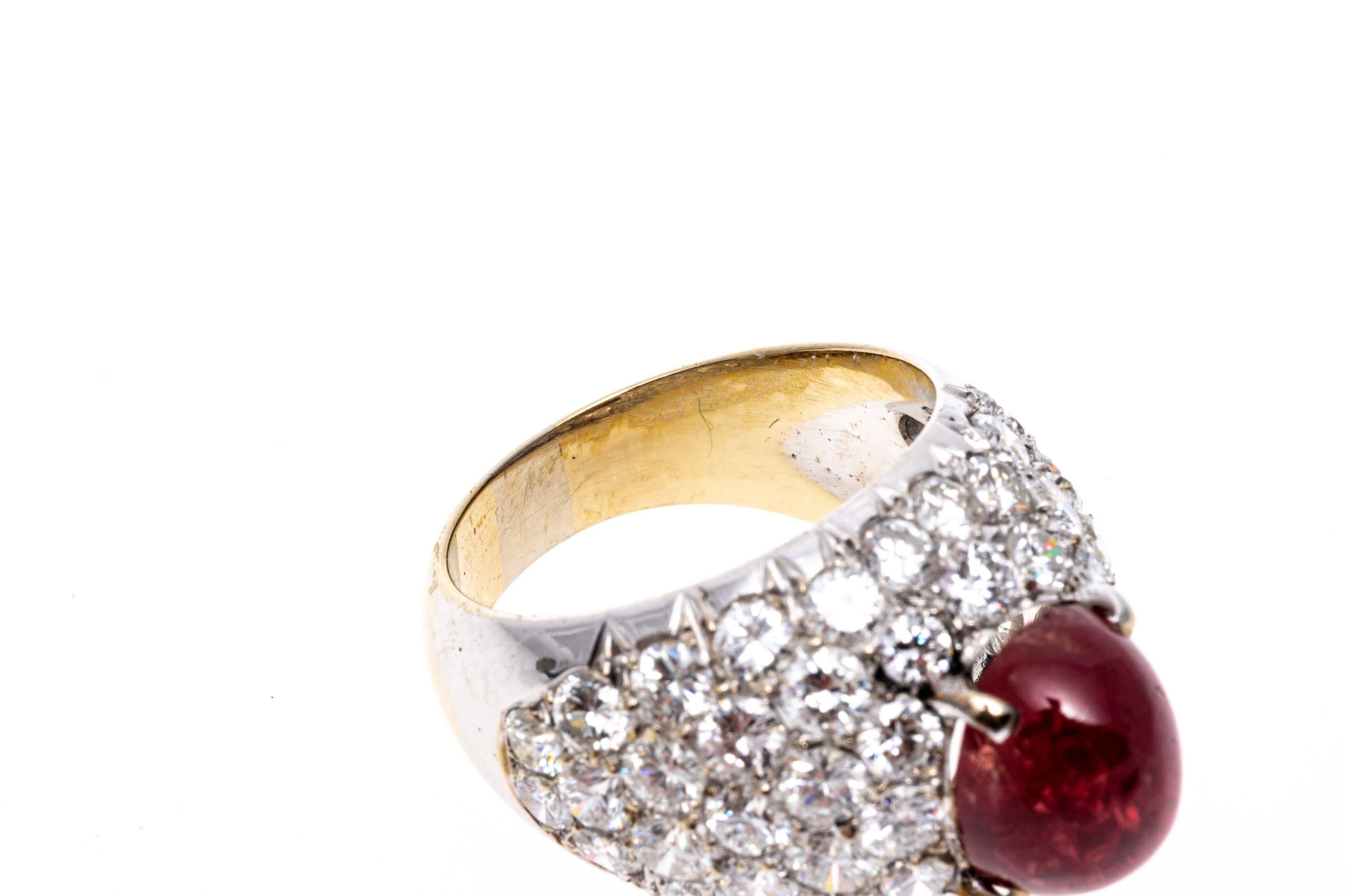 18k Natural No Heat Ruby Cabachon And Large Pave Diamond Dome Ring.
This truly amazing large dome ring features a large cabachon cut, red color natural no heat ruby, approximately 4.54 CTS, surrounded by a field of large, pave set, near colorless