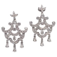 Orecchino a goccia con diamante naturale taglio pera e Brilliante in oro 18k