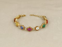 18K gold Navratna nine gem diamond and polki bracelet