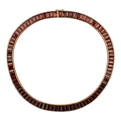Collar de oro de 18 quilates con granates