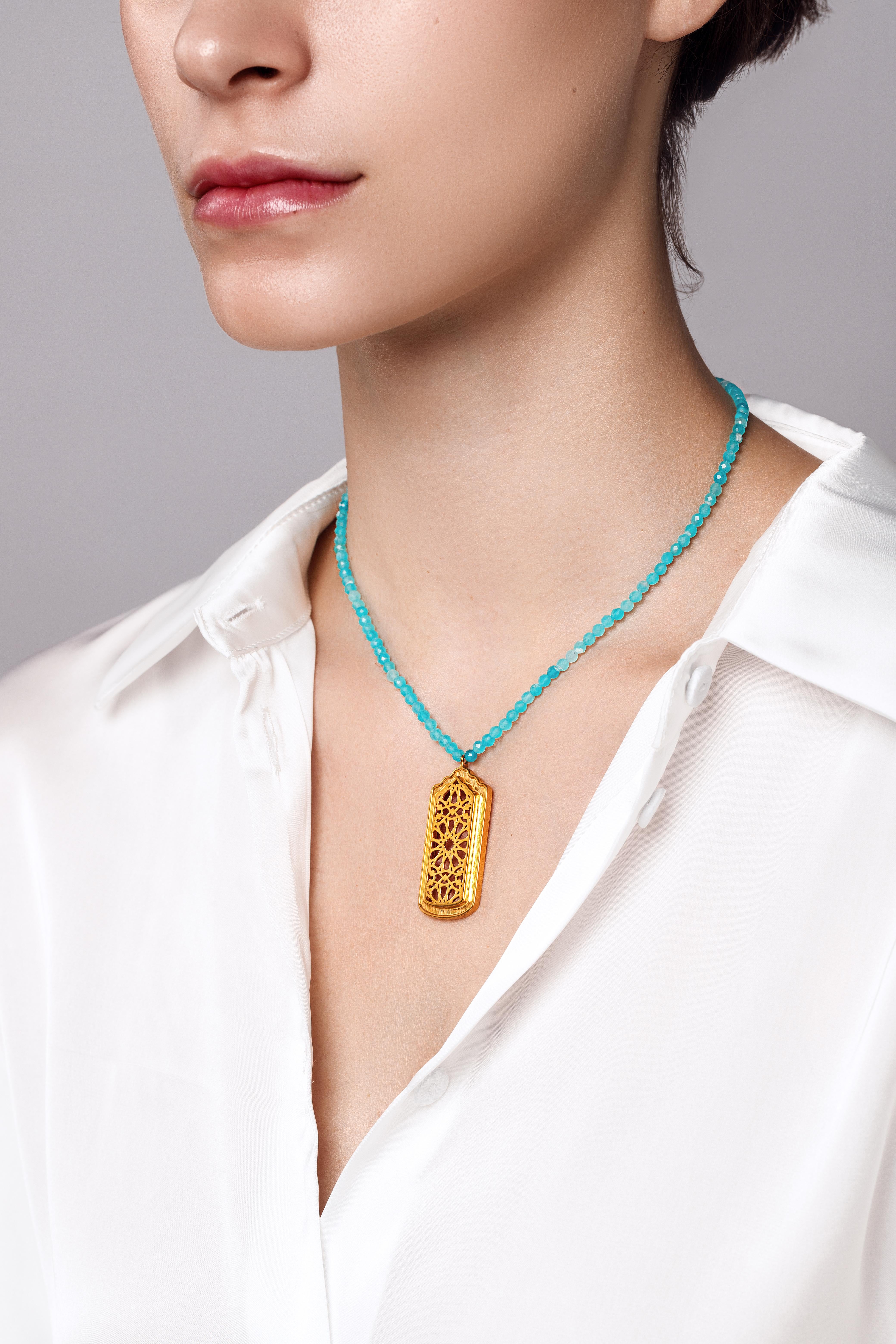 Orosi necklace in 18K solid yellow gold and natural amazonite was designed by Sanaz Doost, Artist & founder of Sanaz Doost Jewelry and inspired by Orosi which is a typical architectural elements of ancient houses and buildings of Middle East &