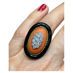 18k gold onyx, coral and diamond cocktail ring 18k gold onyx, coral and diamond cocktail ring
