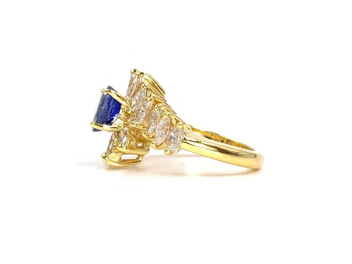 18 Karat Gold Oval Blue Sapphire and Marquise Diamond Cocktail Ring For Sale 4