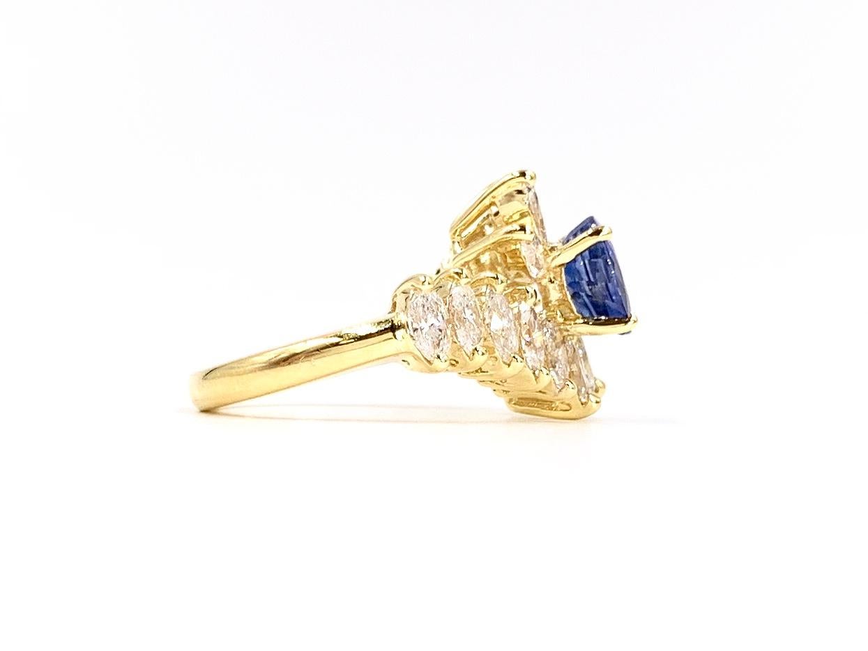 18 Karat Gold Oval Blue Sapphire and Marquise Diamond Cocktail Ring For Sale 2