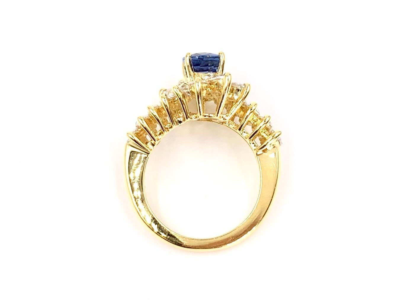 18 Karat Gold Oval Blue Sapphire and Marquise Diamond Cocktail Ring For Sale 3