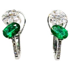 18k Gold Oval kolumbianischen Smaragd Cts 0,66 und Diamant-Ohrringe
