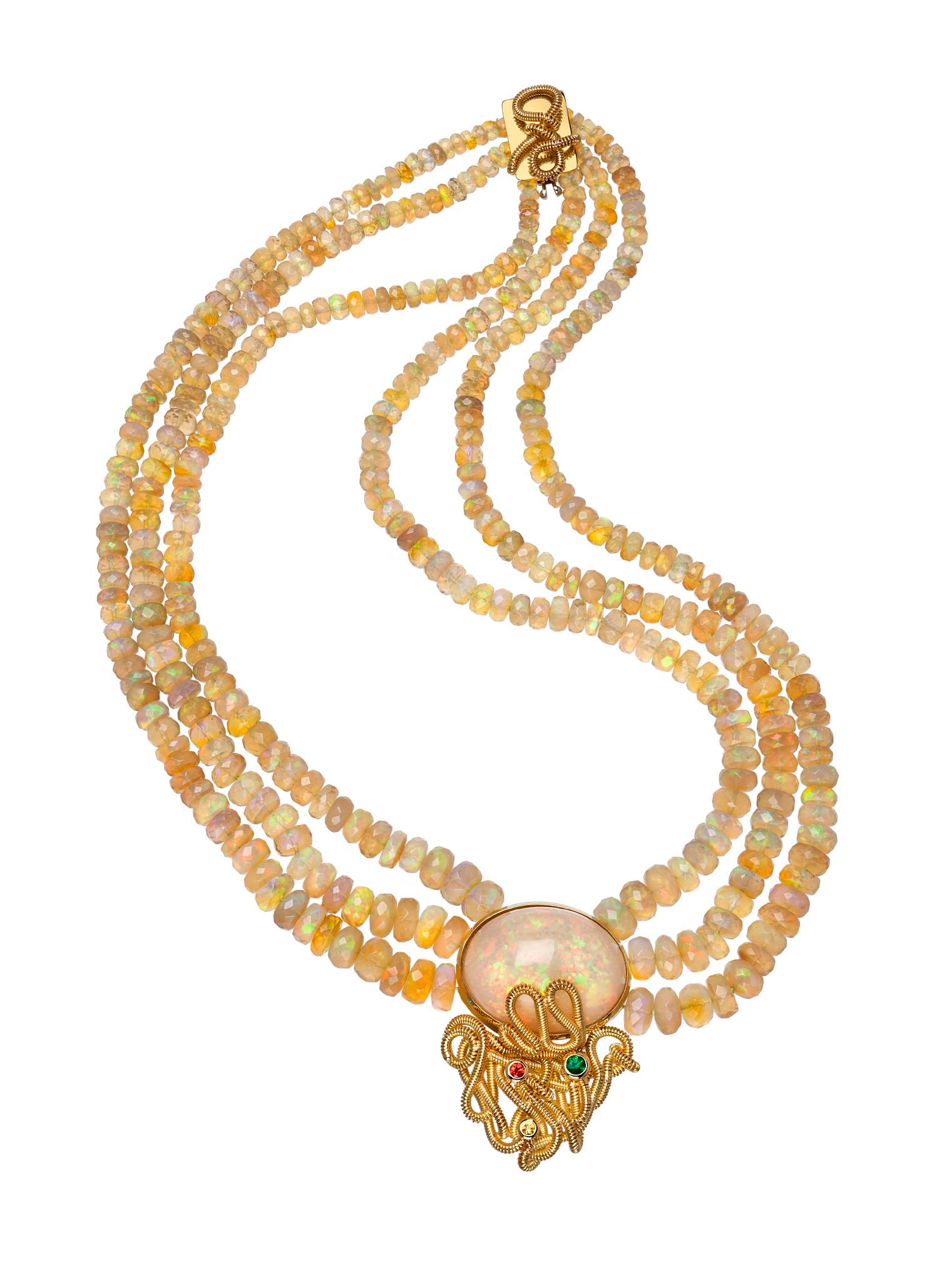 Oval Cut 18k Gold Oval Ethiopian Opal Necklace with Coloured Sapphires and Emeralds For Sale