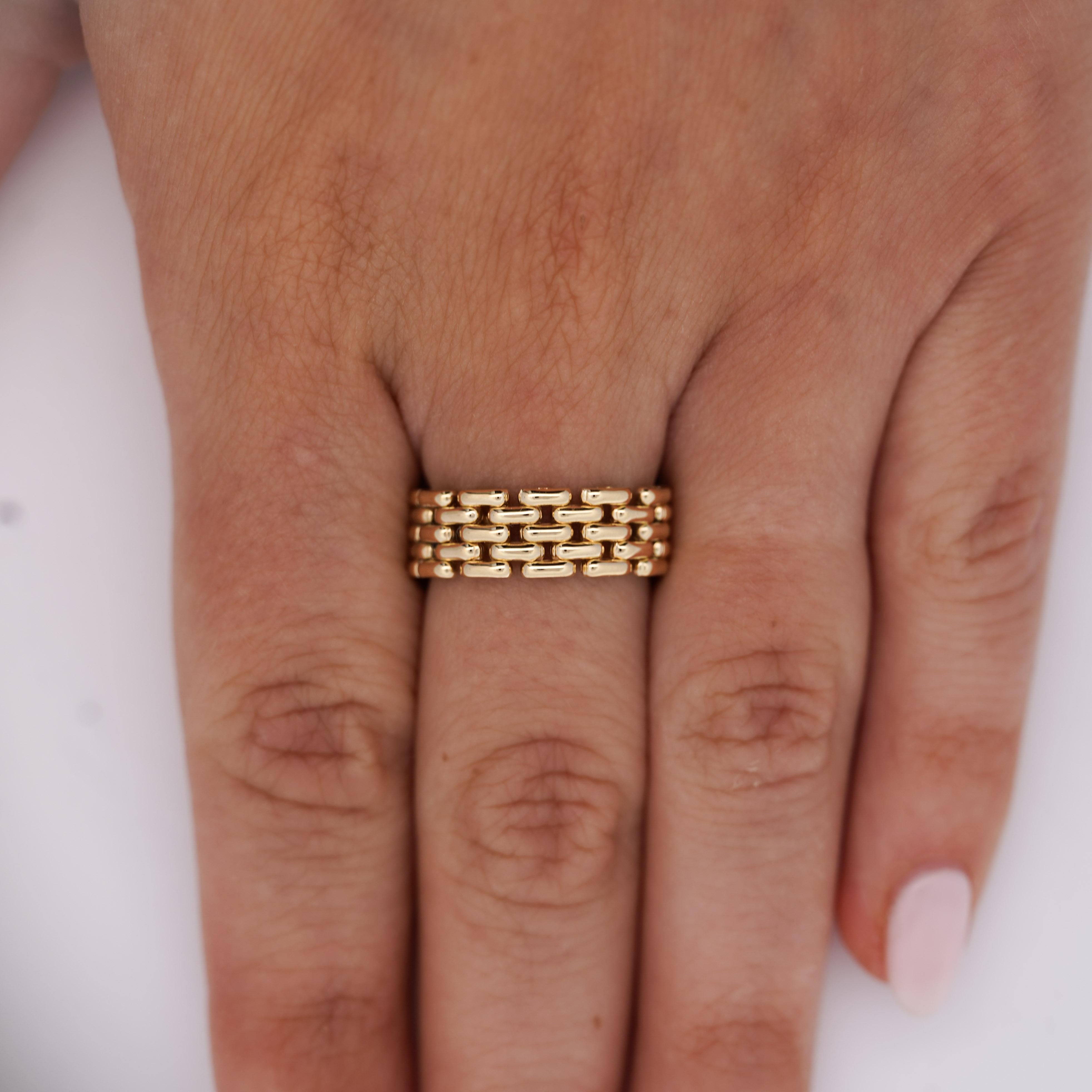 Bague vintage en or jaune 18 carats à maillons ovales interconnectés en finition polie pesant 6,1 grammes. Pièce de créateur avec marquages estampillés 