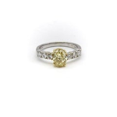 18K Gold Oval Yellow Diamond and Diamond Ring