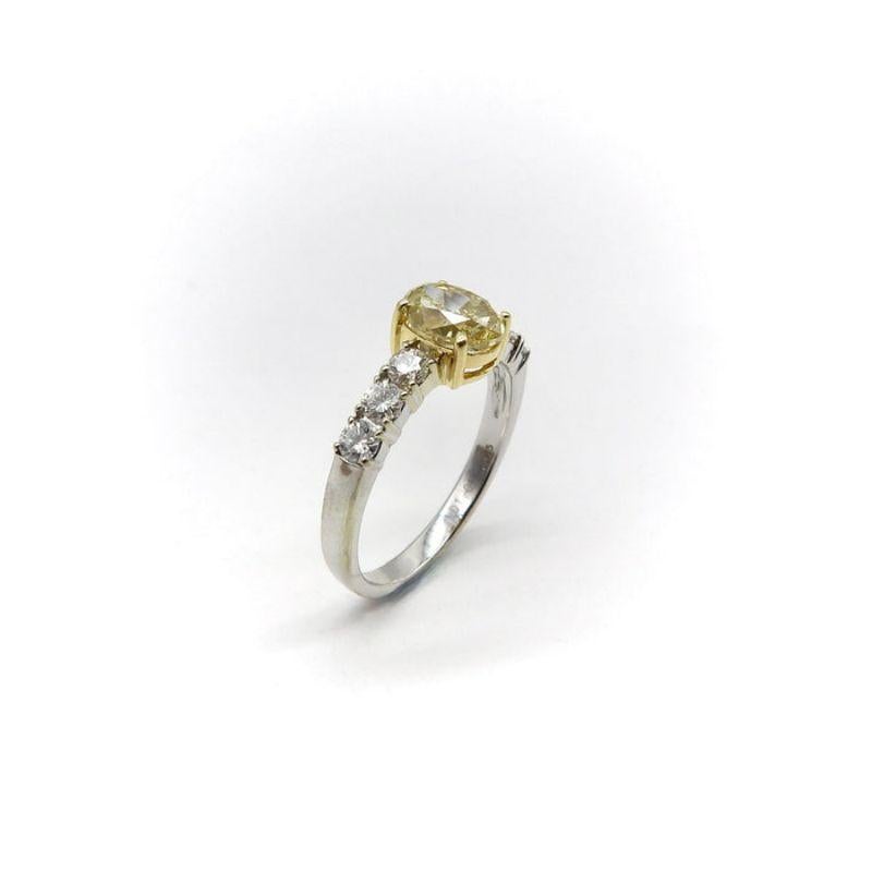 Contemporary 18K Gold Oval Yellow Diamond and Diamond Ring For Sale