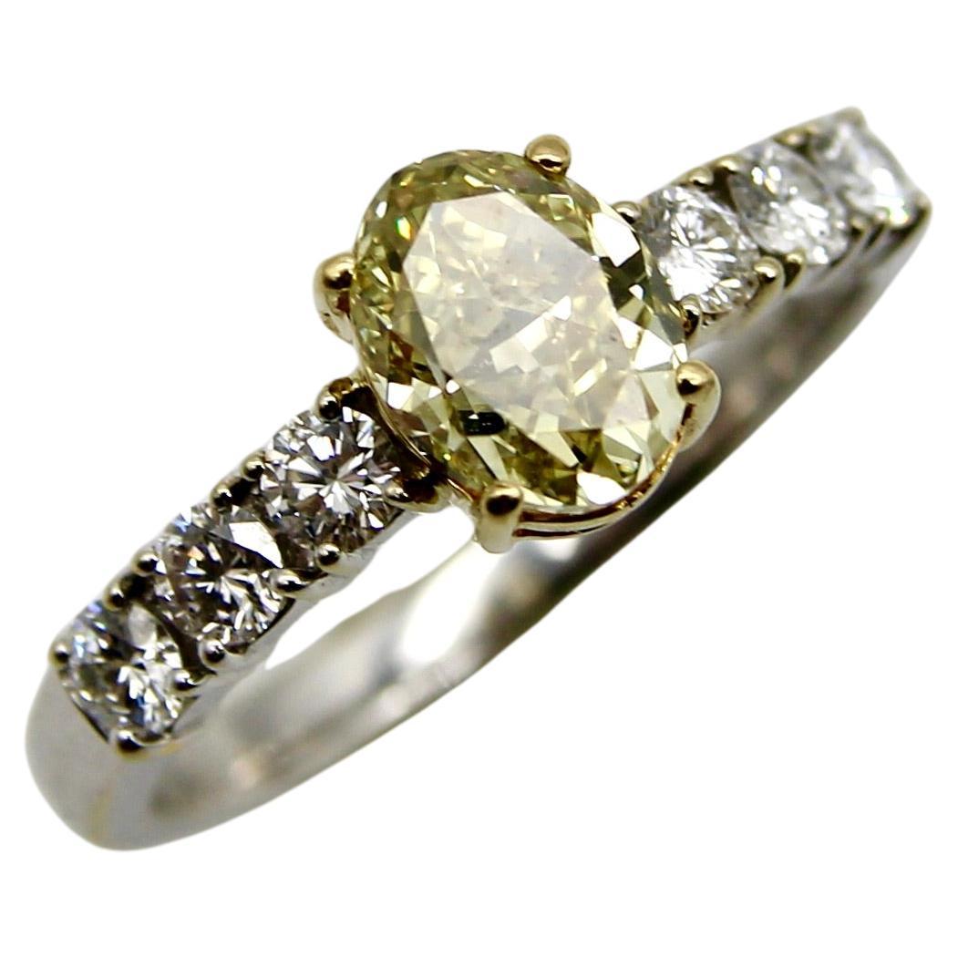 18K Gold Oval Yellow Diamond and Diamond Ring