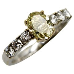 18K Gold Oval Yellow Diamond and Diamond Ring