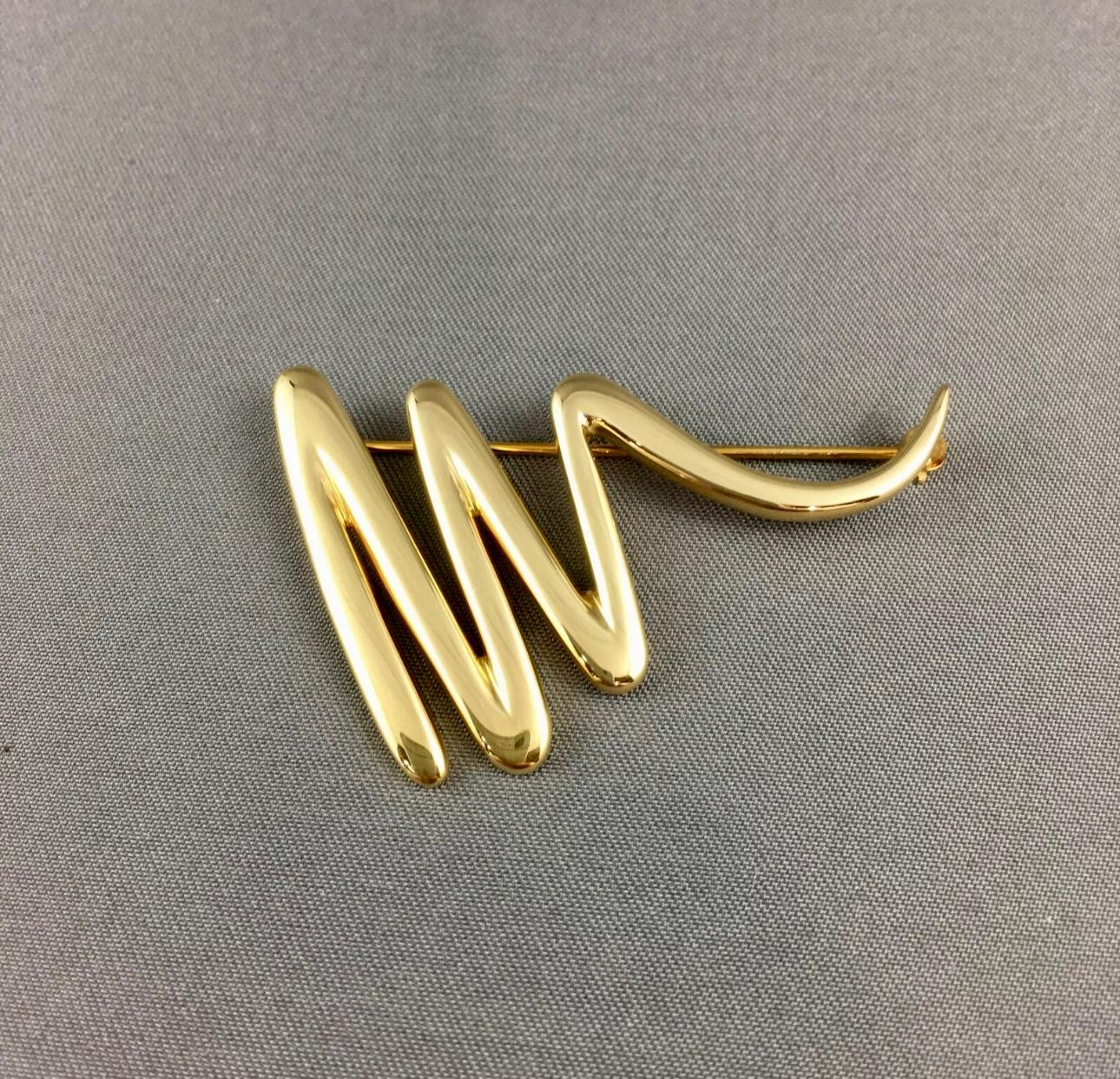 PALOMA PICASSO FOR TIFFANY & CO ZIG-ZAG SQUIGGLE PIN

Description / Condition: Mint. All jewelry has been professionally scrutinize
and cleaned prior to being offered for sale. 
Gender: Woman
Manufacturer: Tiffany & Co.
Model: Paloma Picasso Zig-Zag
