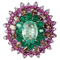 18K Gold, Paraiba Tourmaline, Emeralds, Multi Sapphires 
Diamonds Cocktail Ring
