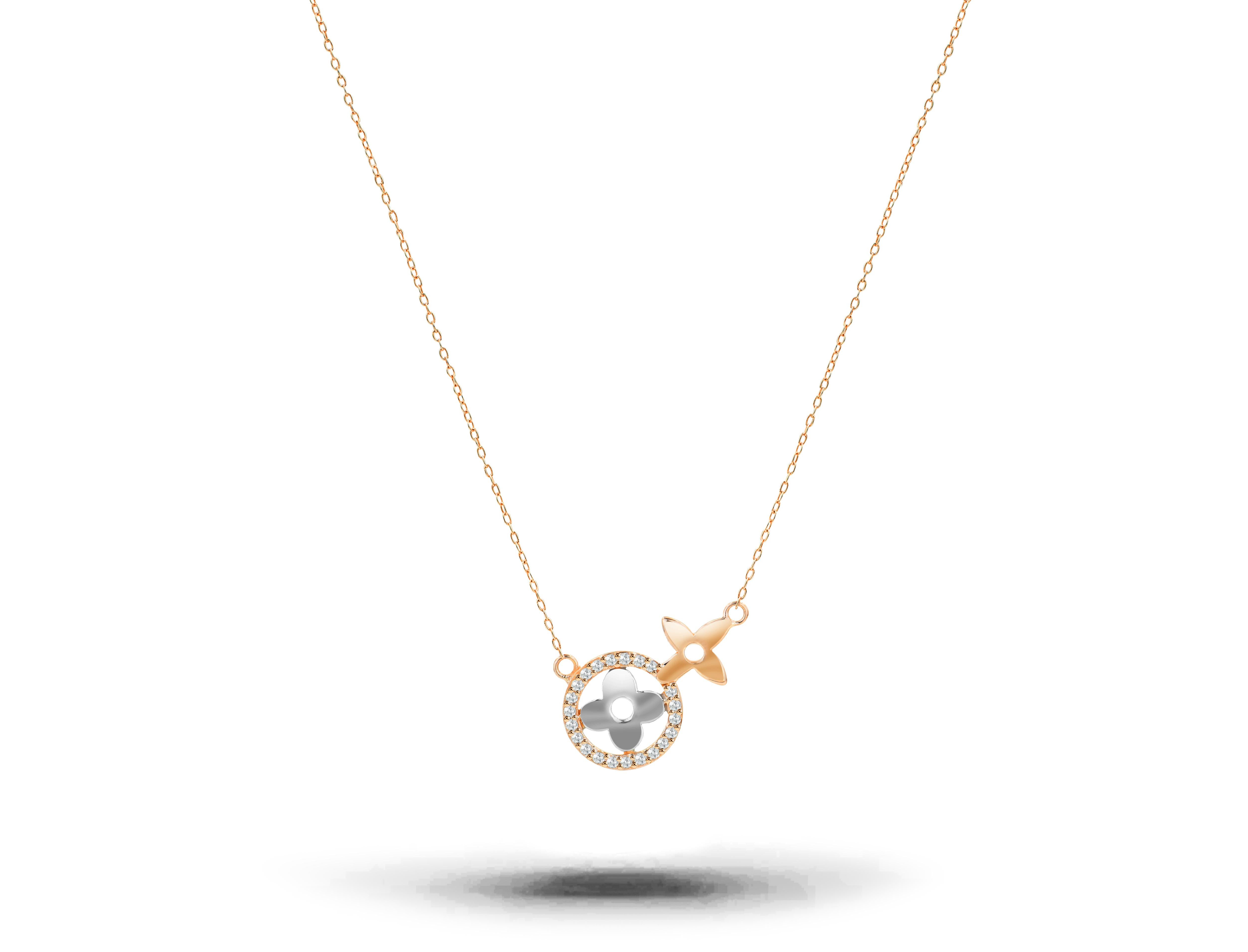 Le collier trèfle à diamants pavés est fabriqué en or massif 18 carats.
Disponible en trois couleurs d'or :  Or rose / Or jaune / Or blanc.

Délicat collier de trèfles porte-bonheur avec diamant naturel. Ce collier minimaliste moderne est un cadeau