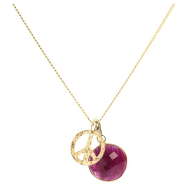Elizabeth Raine, collier pendentif Chakra en or 18 carats avec amulettes de la paix et racines de rubis