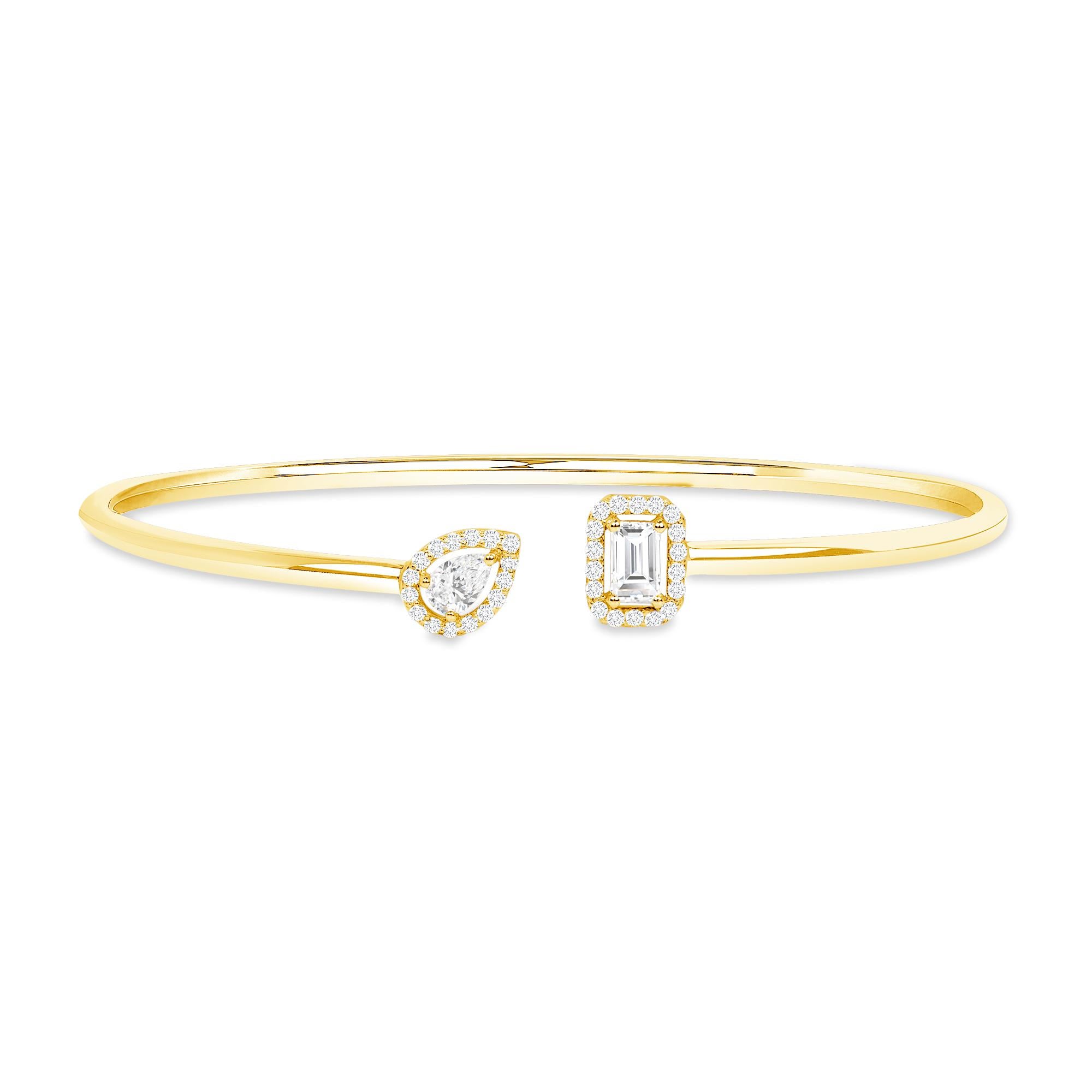 18k Gold Pear and Emerald Diamond Toi et Moi Flexible Cuff Bangle

Elegant 18K gold diamond bracelet highlights two cut styles: the pear cut and the emerald cut, joined by a dazzling entourage of round brilliant-cut diamonds. This bracelet provide