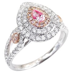 Bague en or 18K avec diamants roses taillés en poire