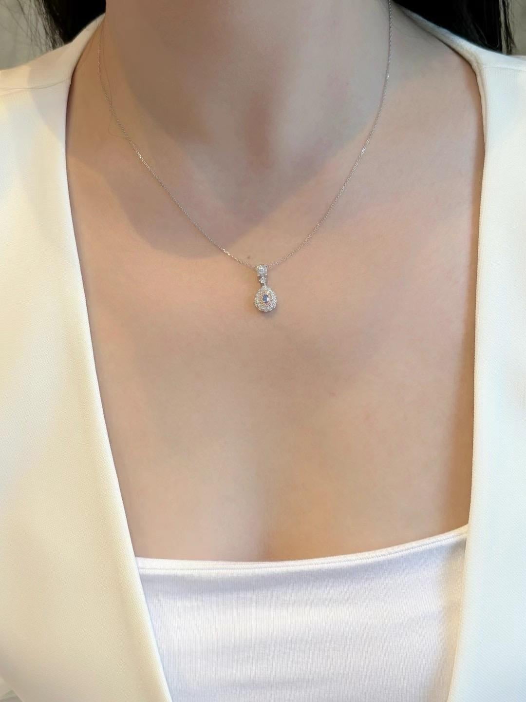 Modern 18K Gold Pear-Cut Vivid Blue Diamond & Diamond Pendant Necklace For Sale