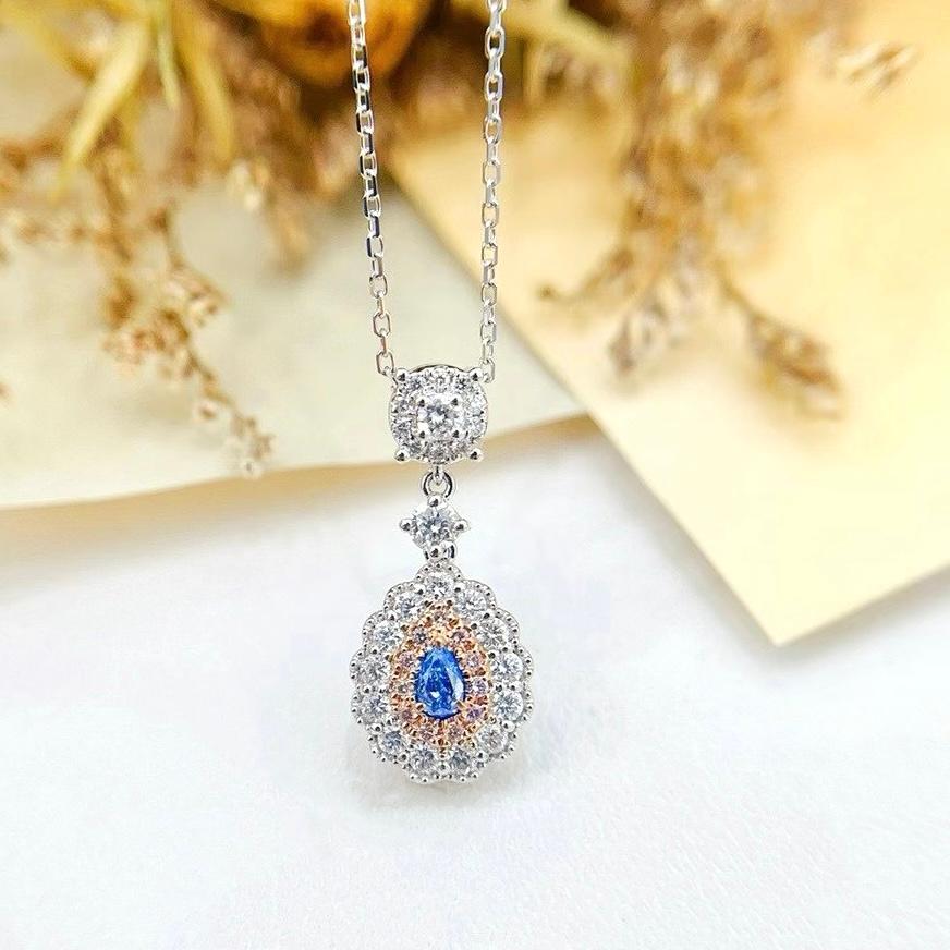 Pear Cut 18K Gold Pear-Cut Vivid Blue Diamond & Diamond Pendant Necklace For Sale