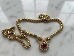 18K Gold Pear Shape Ruby Diamond Necklace with Round and Baguette Diamonds